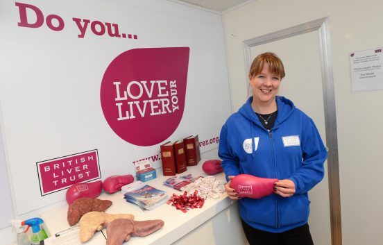 woman holding liver