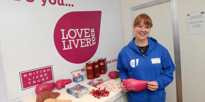 woman holding liver