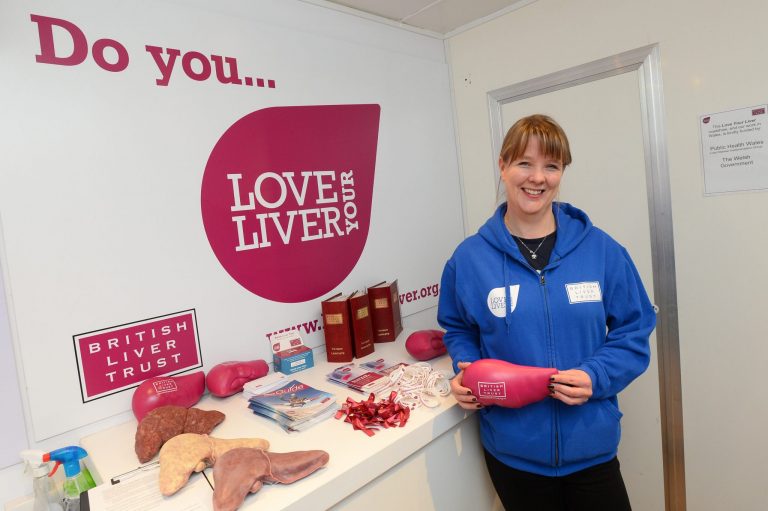 woman holding liver
