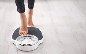 person on scales